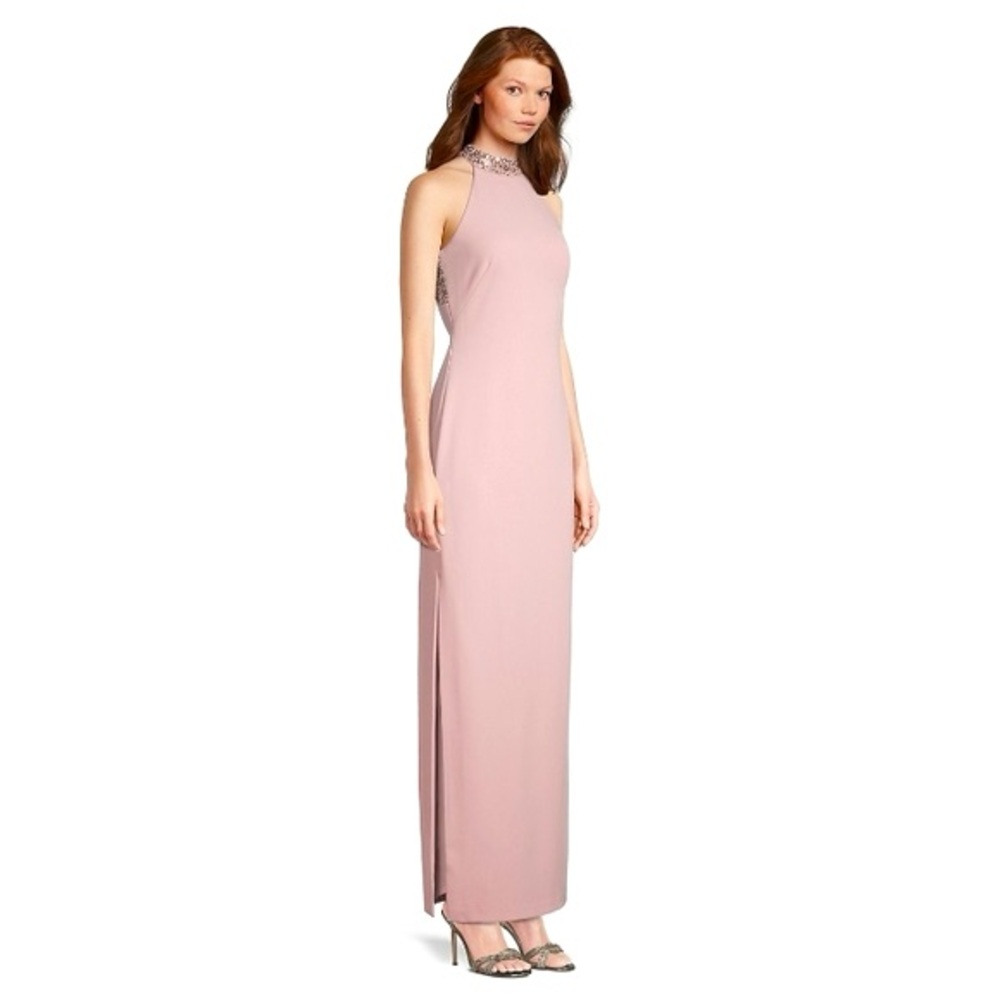 NWT Vince Camuto Halterneck Embellished dress has a high-cut hemline s…
